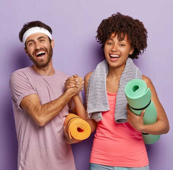 gym buddies holding hands